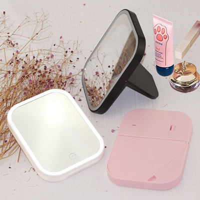 Specchio di trucco cosmetico a mano compatto a LED per design e occasioni quotidiane