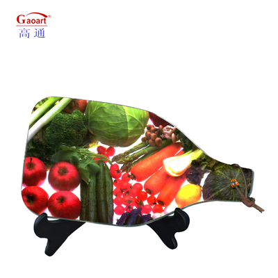 Tabella di taglio in vetro per accessori da cucina funzionali con manico e stile di design a base di frutta